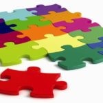 Image of colorful puzzle with one piece removed